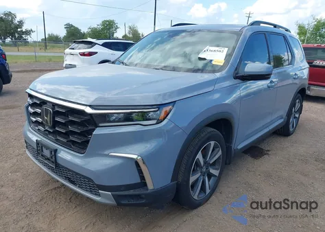 2023 Honda Pilot 2Wd Touring z USA, uszkodzony, nr VIN 5FNYG2H7XPB014642